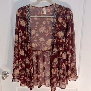 Cute Boho sheer cover up.  Ties under the bust.  Bell sleeves.
